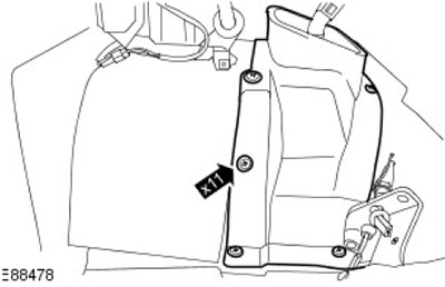9. Свалете капака на трансмисията. Отстранете 11 винта.