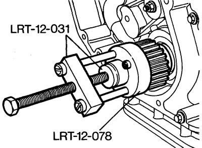 12. Remove the crankshaft timing gear. If you cannot remove it by hand, use the puller LRT-12-03…