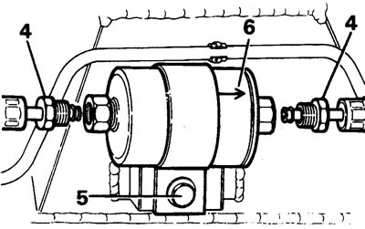 5. Loosen the fuel filter clamp bolt and remove the filter.