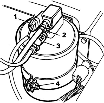 4. Loosen the fuel vapor collector clamp bolt and remove the collector.