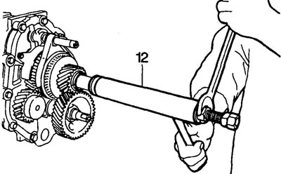 12. Using mandrels LRT-37-015 and LRT-37-021, press the rear bearing race onto the secondary shaft…