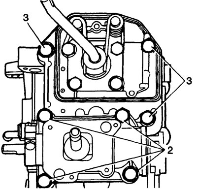 2. Install the transfer case shift housing. Tighten the four mounting bolts to 25 Nm.