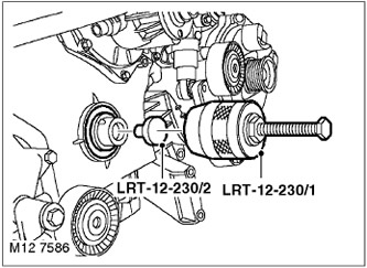 6. Монтирайте дърпача LRT-12-230/1 и ограничителя LRT-12-230/2 и отстранете предното маслено…