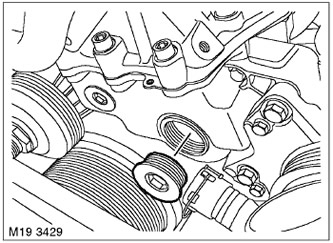 11. Развийте тапата на монтажния прозорец в капака на синхронизацията и изхвърлете уплътнението.