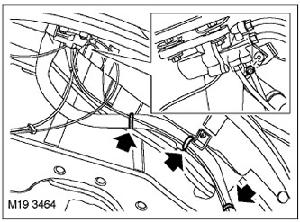 13. Cut the 3 wire ties securing the air suspension tubes to the filler pipe.
