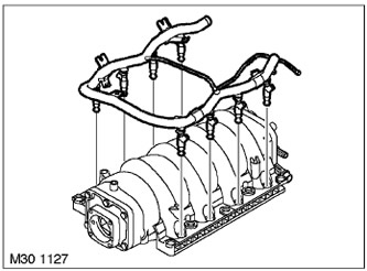 40. Развийте болта, закрепващ горивната релса към всмукателния колектор и отстранете релсата с…