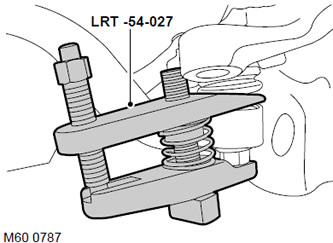 10. С помощта на инструмент LRT-54-027 освободете сферичната става на долното рамо и отделете…