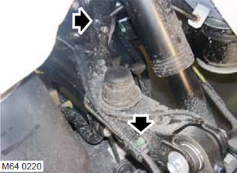 7. Отстранете шестостенните винтове, които закрепват скобите на спирачния маркуч към горните рамена…